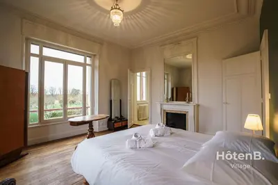 Un ou plusieurs lits dans un hébergement de l'établissement Maison Léonce Blanc - Prestige in Lubersac