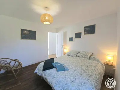 Un ou plusieurs lits dans un hébergement de l'établissement La maison de pierre