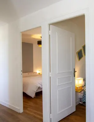 Un ou plusieurs lits dans un hébergement de l'établissement La maison de pierre