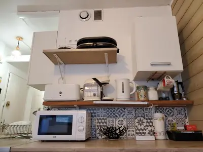 Cuisine ou kitchenette dans l'établissement Studio à Super Besse 800m des pistes