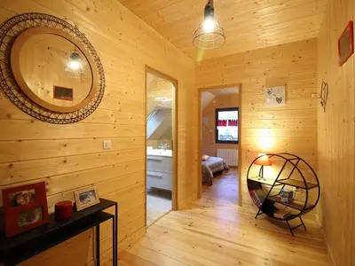 Un ou plusieurs lits dans un hébergement de l'établissement Chalet moderne 8 pers au Mont-Dore, terrasse et parking - FR-1-608-281