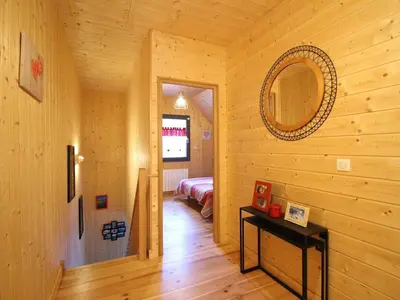 Un ou plusieurs lits dans un hébergement de l'établissement Chalet moderne 8 pers au Mont-Dore, terrasse et parking - FR-1-608-281