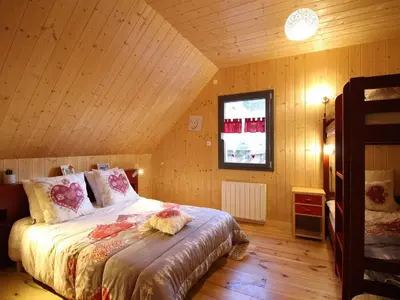 Un ou plusieurs lits dans un hébergement de l'établissement Chalet moderne 8 pers au Mont-Dore, terrasse et parking - FR-1-608-281