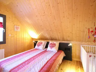 Un ou plusieurs lits dans un hébergement de l'établissement Chalet moderne 8 pers au Mont-Dore, terrasse et parking - FR-1-608-281