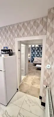 Cuisine ou kitchenette dans l'établissement S-e-r-a-l-y 1