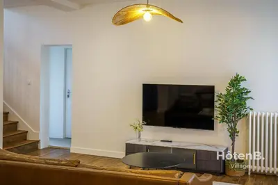 Télévision ou salle de divertissement dans l'établissement Villa de Plaisance Élégance et Confort