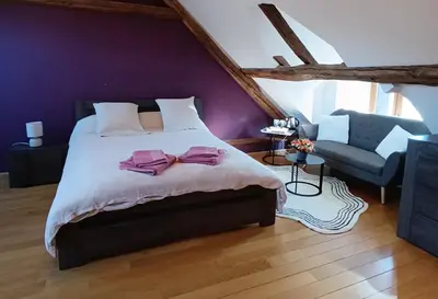 Un ou plusieurs lits dans un hébergement de l'établissement Villas de Leypinas B&B
