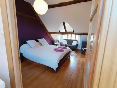Un ou plusieurs lits dans un hébergement de l'établissement Villas de Leypinas B&B