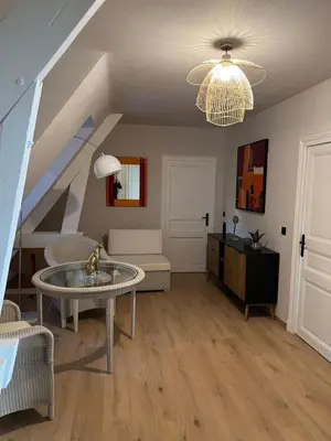 Coin salon dans l'établissement Très grande maison de caractère - 15 personnes rénovée