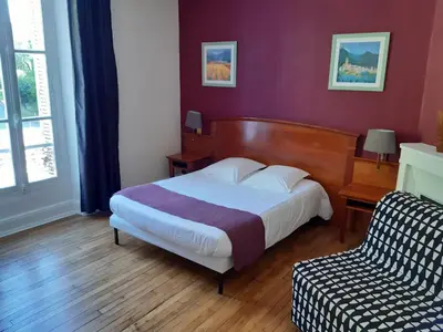 Un ou plusieurs lits dans un hébergement de l'établissement Auberge de la marquise