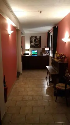 Télévision ou salle de divertissement dans l'établissement Auberge de la marquise