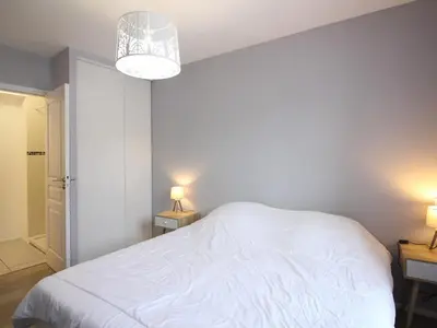 Un ou plusieurs lits dans un hébergement de l'établissement Appartement T2 au centre, Wi-Fi, 4 pers, proche thermes - FR-1-608-282