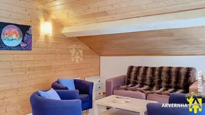 Coin salon dans l'établissement Chalet Guerêve