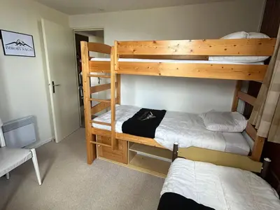 Un ou plusieurs lits dans un hébergement de l'établissement Spacieux Appartement au Pied des Pistes - FR-1-814-21