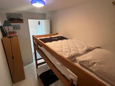 Un ou plusieurs lits dans un hébergement de l'établissement Appartement skis aux pieds, F2+Cabine au 20ème étage - FR-1-814-25
