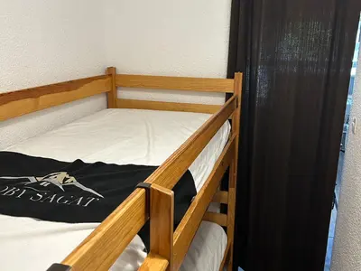Un ou plusieurs lits dans un hébergement de l'établissement Studio Idéalement situé au centre de la station - FR-1-814-32