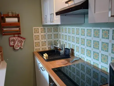 Cuisine ou kitchenette dans l'établissement Appartement lumineux sud au cœur de Super Besse - FR-1-814-59