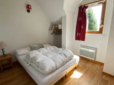 Un ou plusieurs lits dans un hébergement de l'établissement Duplex familial spacieux en pleine nature - FR-1-814-60