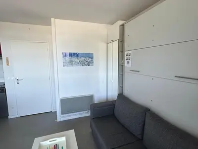 Coin salon dans l'établissement Superbe T2 Cabine avec Terrasse et Parking à Super Besse - FR-1-814-66