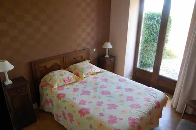 Un ou plusieurs lits dans un hébergement de l'établissement Gîte familial à la campagne