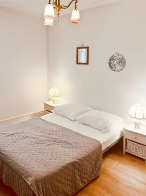 Un ou plusieurs lits dans un hébergement de l'établissement Maison au coeur de MARCOLES, 2ch, 4pers, jardin