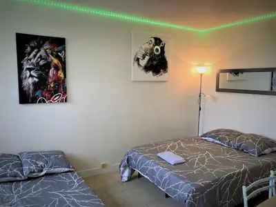Un ou plusieurs lits dans un hébergement de l'établissement Appartement double à LIMOGES