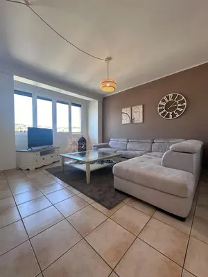 Coin salon dans l'établissement Casa Ribot #10 - T4 pour 5 personnes - Proche Centre Ville