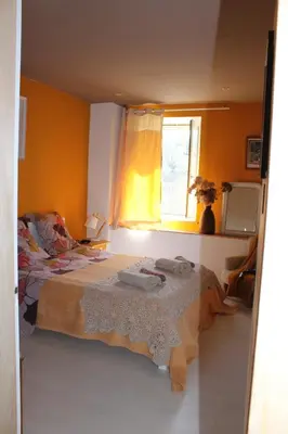 Un ou plusieurs lits dans un hébergement de l'établissement Chambres d'hôtes Par Hasard