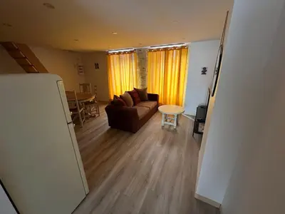 Coin salon dans l'établissement Appart Montignac