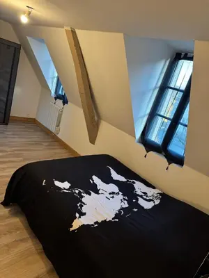 Un ou plusieurs lits dans un hébergement de l'établissement Appartement plein centre