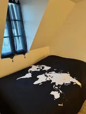 Un ou plusieurs lits dans un hébergement de l'établissement Appartement plein centre
