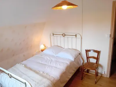 Un ou plusieurs lits dans un hébergement de l'établissement Maison de charme à la campagne