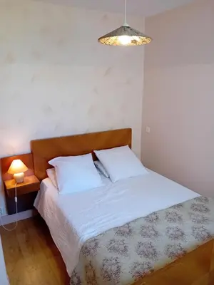 Un ou plusieurs lits dans un hébergement de l'établissement Maison de charme à la campagne