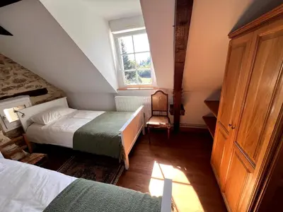 Un ou plusieurs lits dans un hébergement de l'établissement Gîte de Gilbert