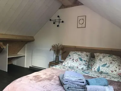 Un ou plusieurs lits dans un hébergement de l'établissement Studio au cœur du sancy