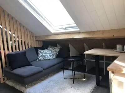 Coin salon dans l'établissement Studio au cœur du sancy