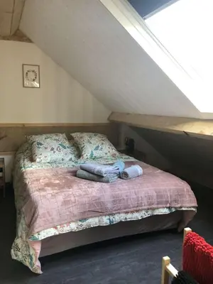 Un ou plusieurs lits dans un hébergement de l'établissement Studio au cœur du sancy
