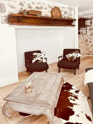 Coin salon dans l'établissement Maison Chez Madeleine 4 pers, Entre le Lioran et Vic-sur-Cère