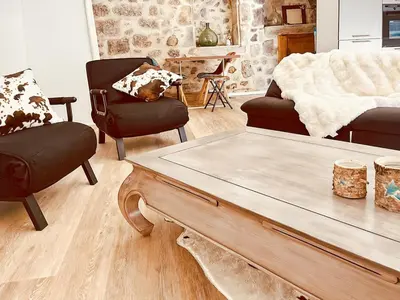 Coin salon dans l'établissement Maison Chez Madeleine 4 pers, Entre le Lioran et Vic-sur-Cère