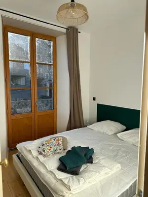 Un ou plusieurs lits dans un hébergement de l'établissement Appartement de la côte