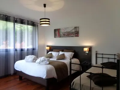Un ou plusieurs lits dans un hébergement de l'établissement Villa La Bénéchie