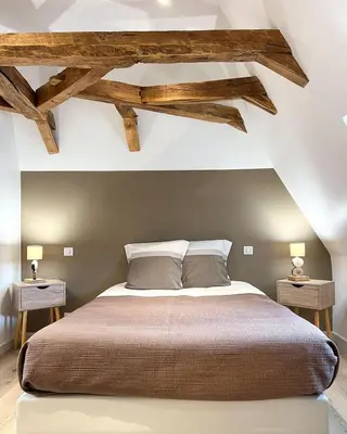 Un ou plusieurs lits dans un hébergement de l'établissement Villa de 150m2, 4 ch, 4 SDB, Wifi, Patio, Vallée de la Jordanne