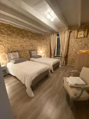 Un ou plusieurs lits dans un hébergement de l'établissement Gîte D Arsonval