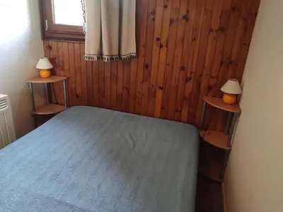 Un ou plusieurs lits dans un hébergement de l'établissement Appartement spacieux au pied des pistes à Super Besse - FR-1-814-87