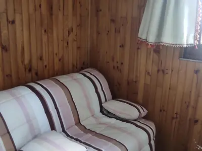 Coin salon dans l'établissement Appartement spacieux au pied des pistes à Super Besse - FR-1-814-87