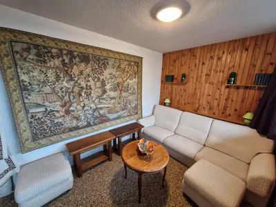 Coin salon dans l'établissement Appartement spacieux au pied des pistes à Super Besse - FR-1-814-87