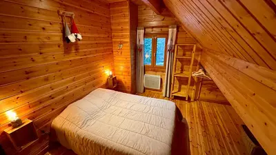 Un ou plusieurs lits dans un hébergement de l'établissement Chalet Ô Mont Dore