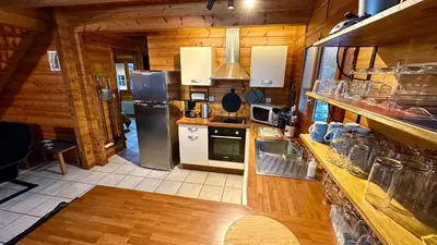 Cuisine ou kitchenette dans l'établissement Chalet Ô Mont Dore