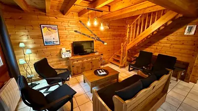 Coin salon dans l'établissement Chalet Ô Mont Dore