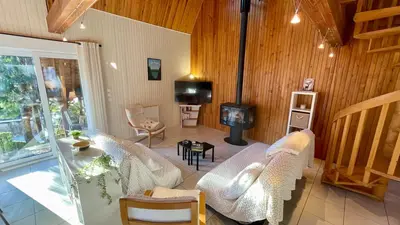 Coin salon dans l'établissement Le Joli Cèdre 8pers Le Mont Dore